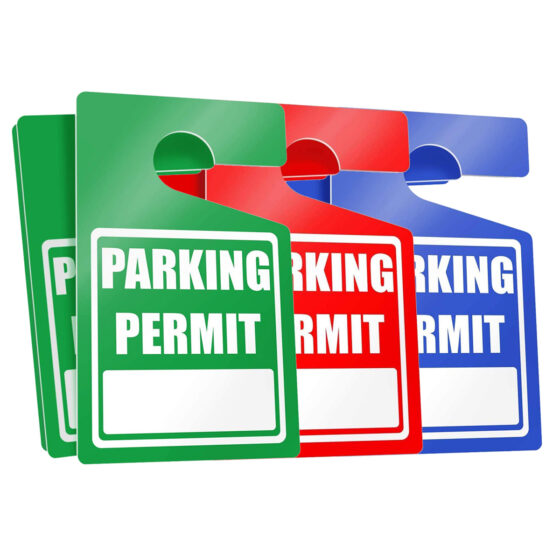 Green, red, and blue parking permits side by side
